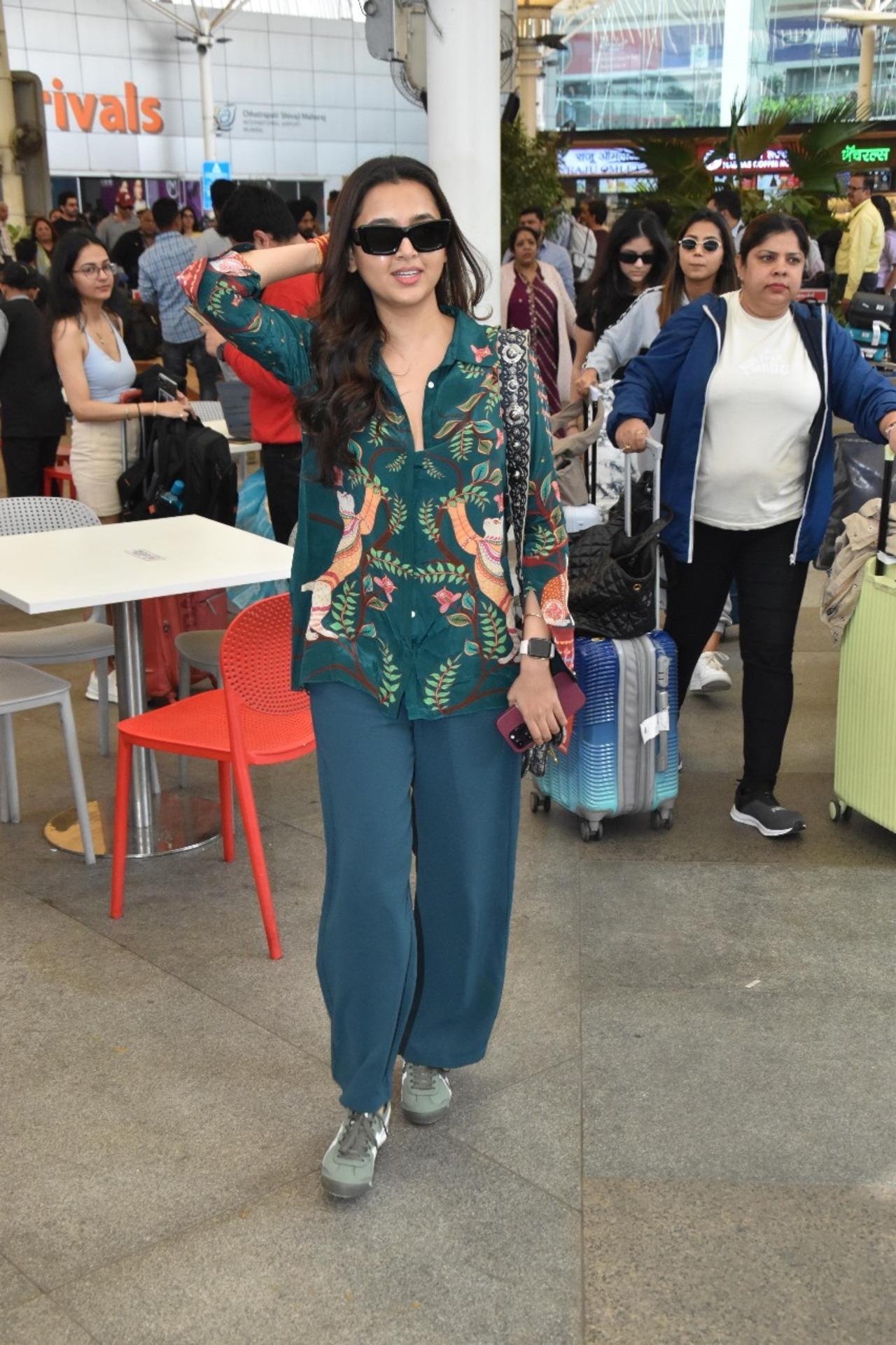 'Bigg Boss 15' winner Tejasswi Prakash left the airport wearing a loose green floral top, which she donned with light blue leggings